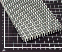 corrugated aluminium component made with evaporative lubricant